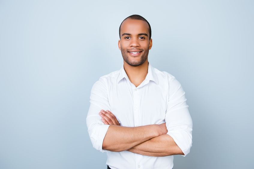 Successful smiling young handsome mulatto american guy lawyer in